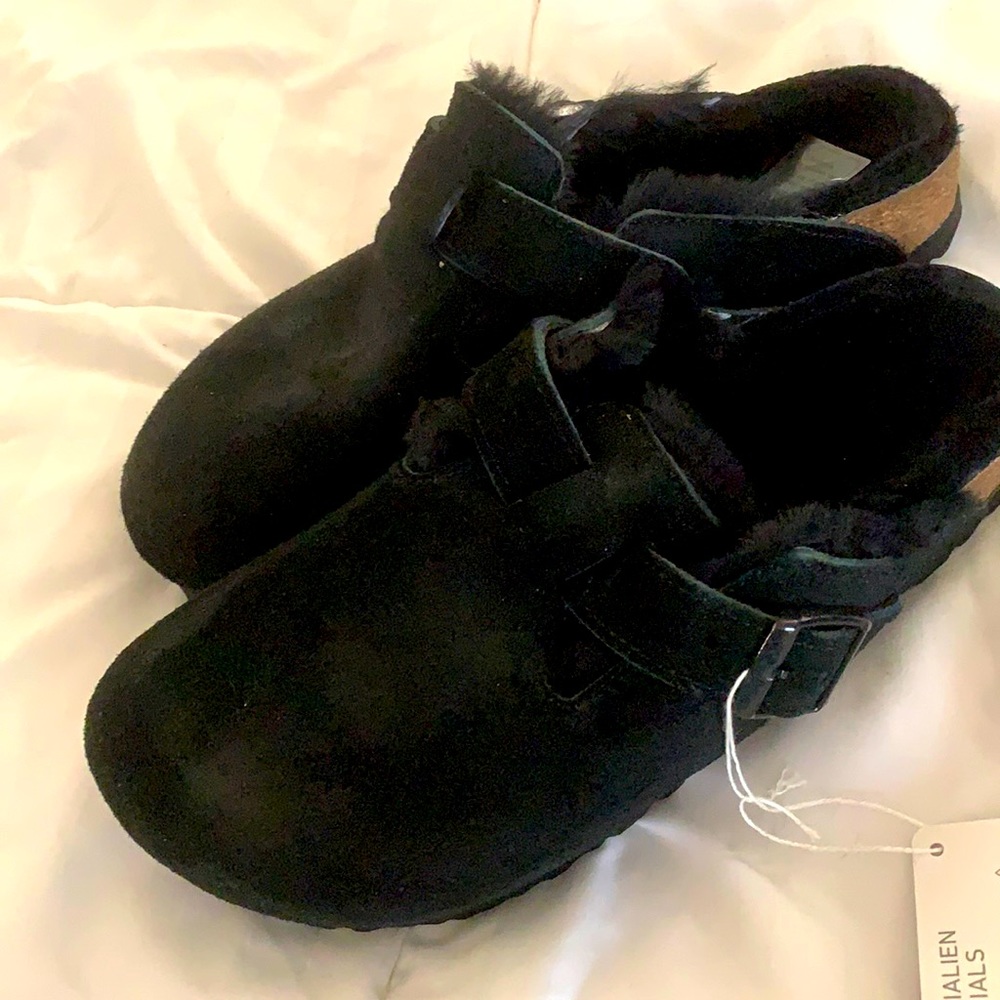 Boston black with black lamb lining.